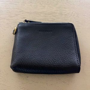 Genuine, soft black leather Tecovas wallet with zipper. 8 card slots.